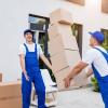 two-removal-company-workers-are-loading-boxes